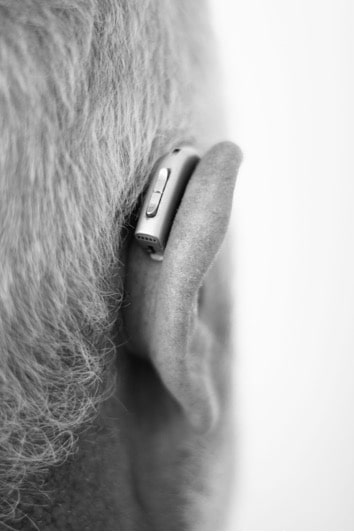 man with hearing device