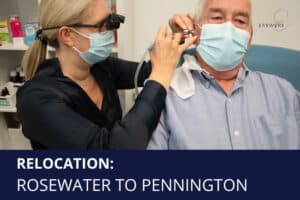 Earworx nurse examining patient ear with otoscope